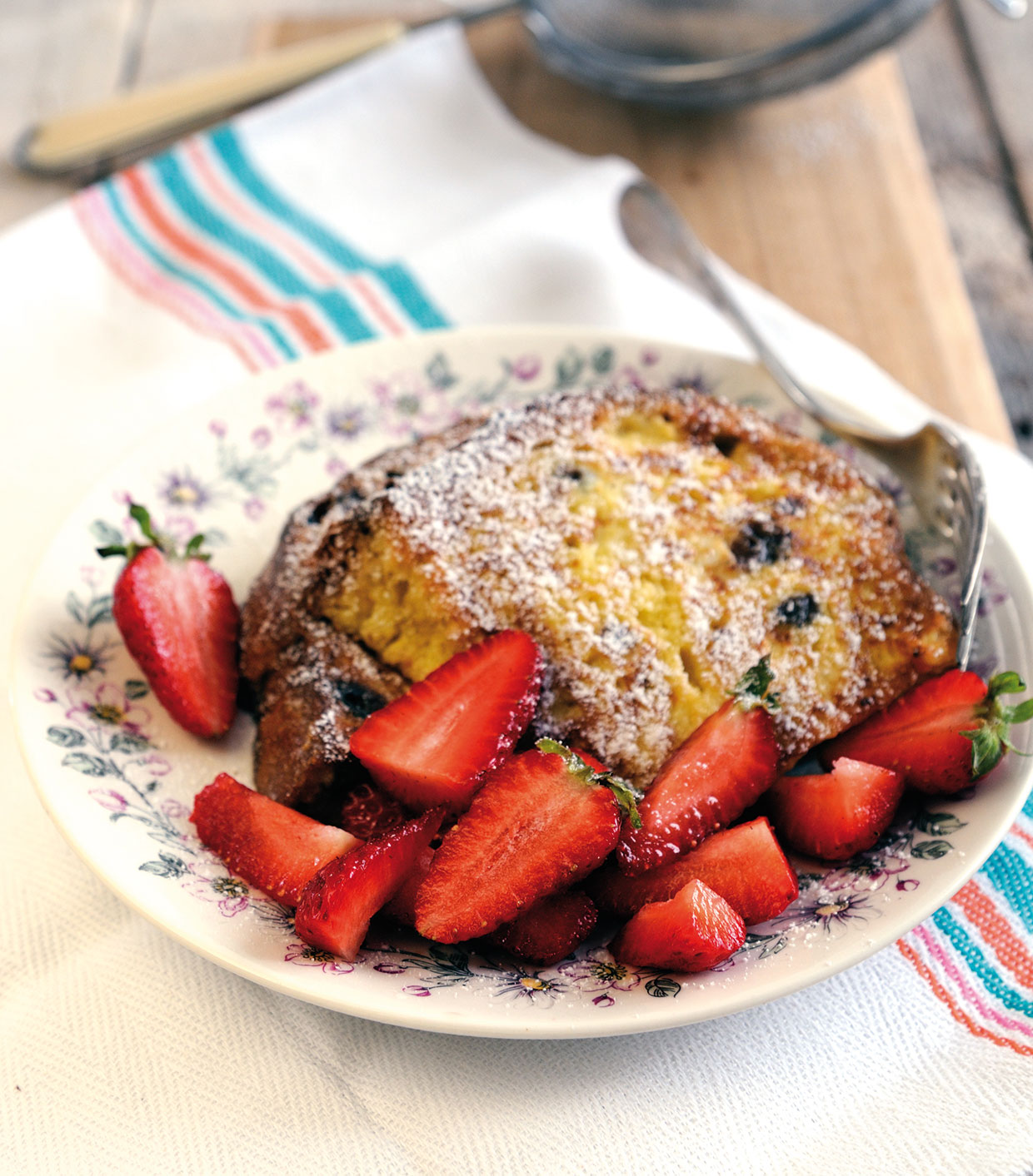 leftover panettone pudding served with strawberries