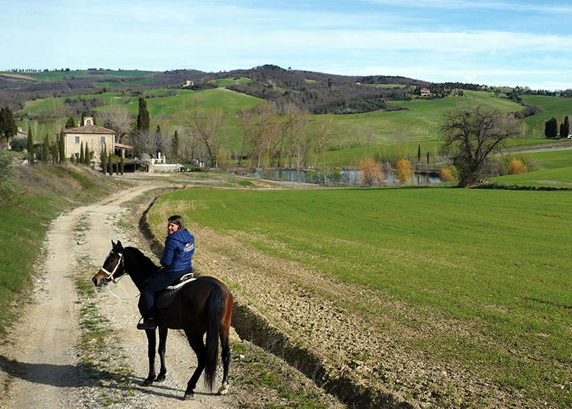 Amy McPherson on horse at Borgo Pignano