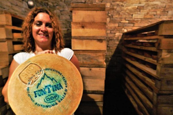 Marta with her Fontina cheese