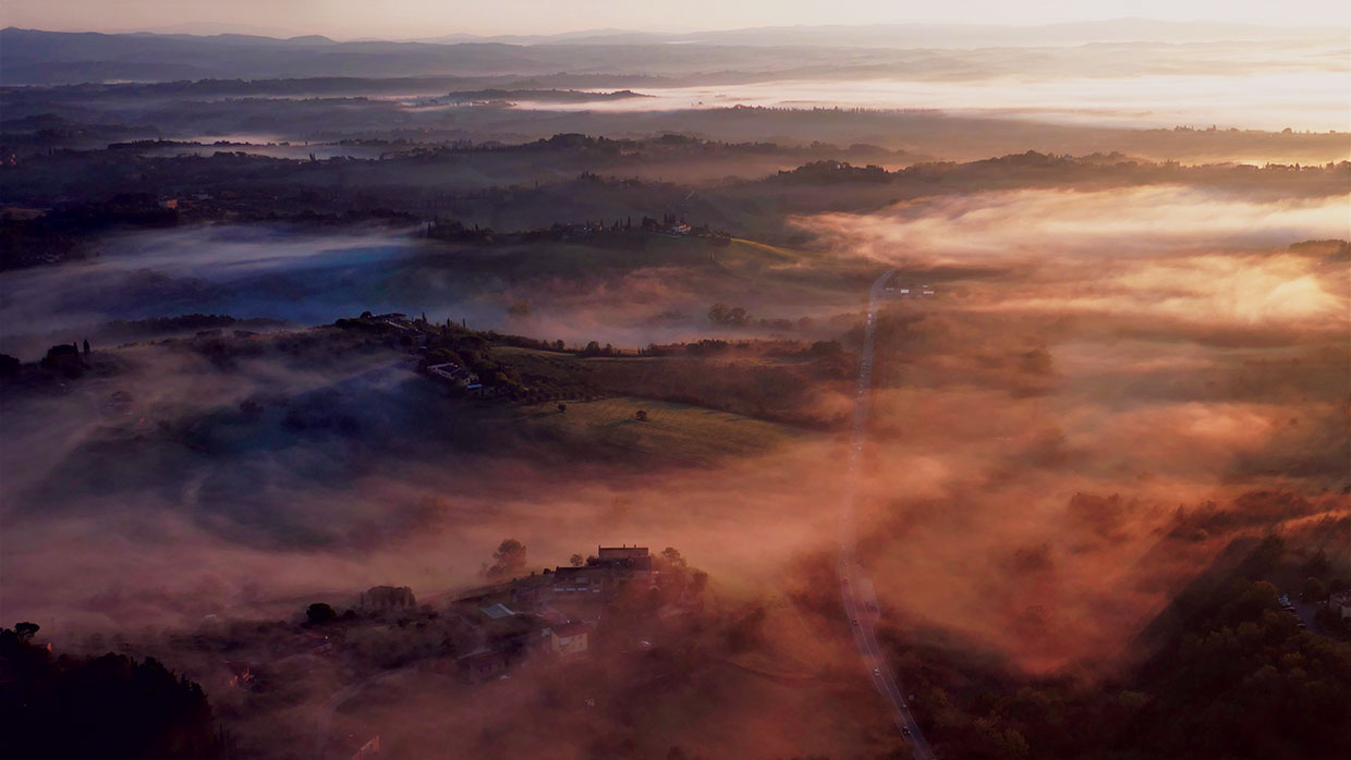 view of Tuscany from above siena in hot air balloon