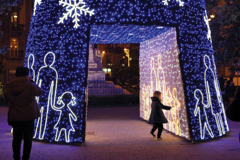 In front of Salerno’s Stazione, travellers can walk through the train station’s Christmas “Tree”