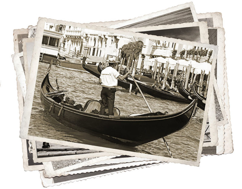 Stack of old vintage photos in Venice Italy