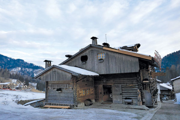 Hotel Garni Plueme surrounded by dolomites mountains